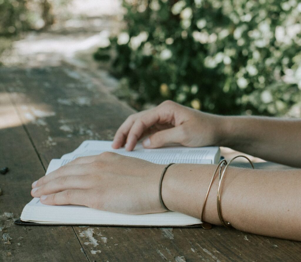Woman reads a bible for her bible study