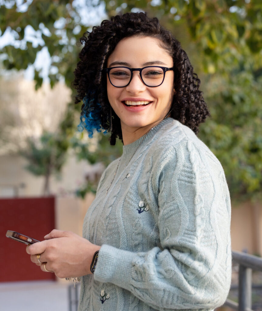 Woman holding a notebook while attending a parenting or life skills at PRC Grand Rapids.